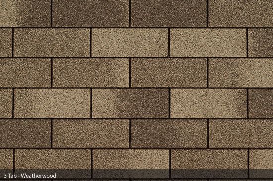 Close-up of brown 3-tab asphalt roof shingles with a weathered appearance.