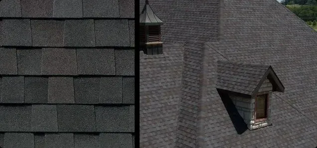 Overhead shot of a dark gray shingle roof with a dormer window.