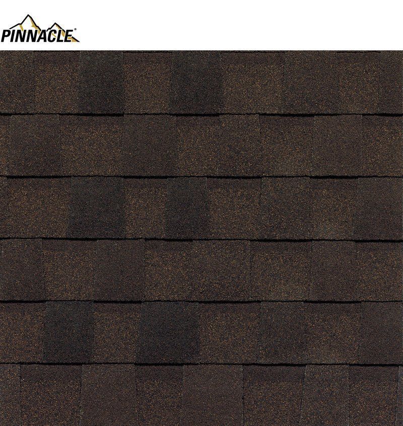 Close-up of brown asphalt roof shingles with the Pinnacle logo in the top left corner.