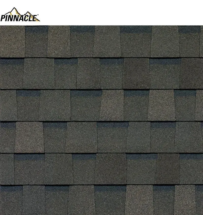 Dark gray Pinnacle roofing shingles in an overlapping pattern.