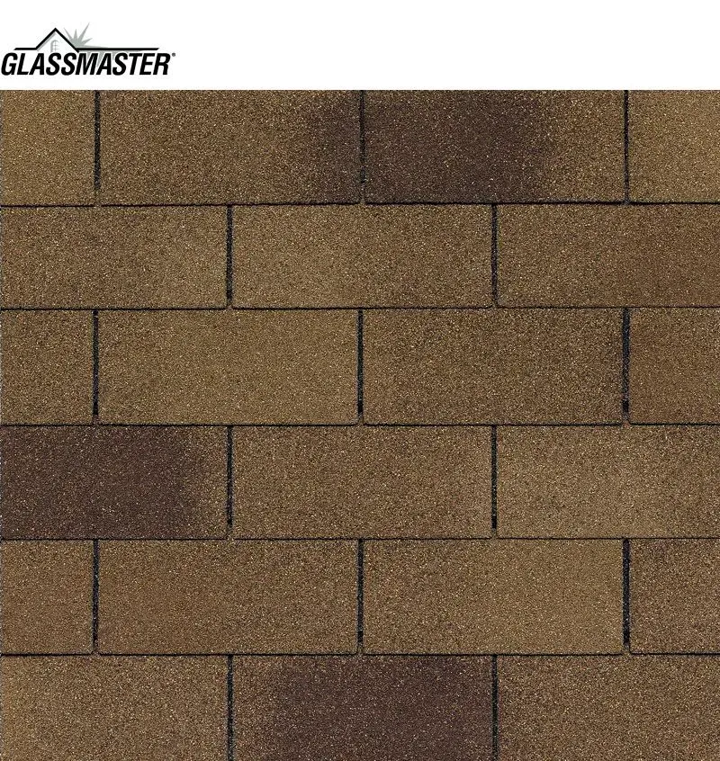 Close-up of brown asphalt shingles with varying shades, arranged in a brick pattern.