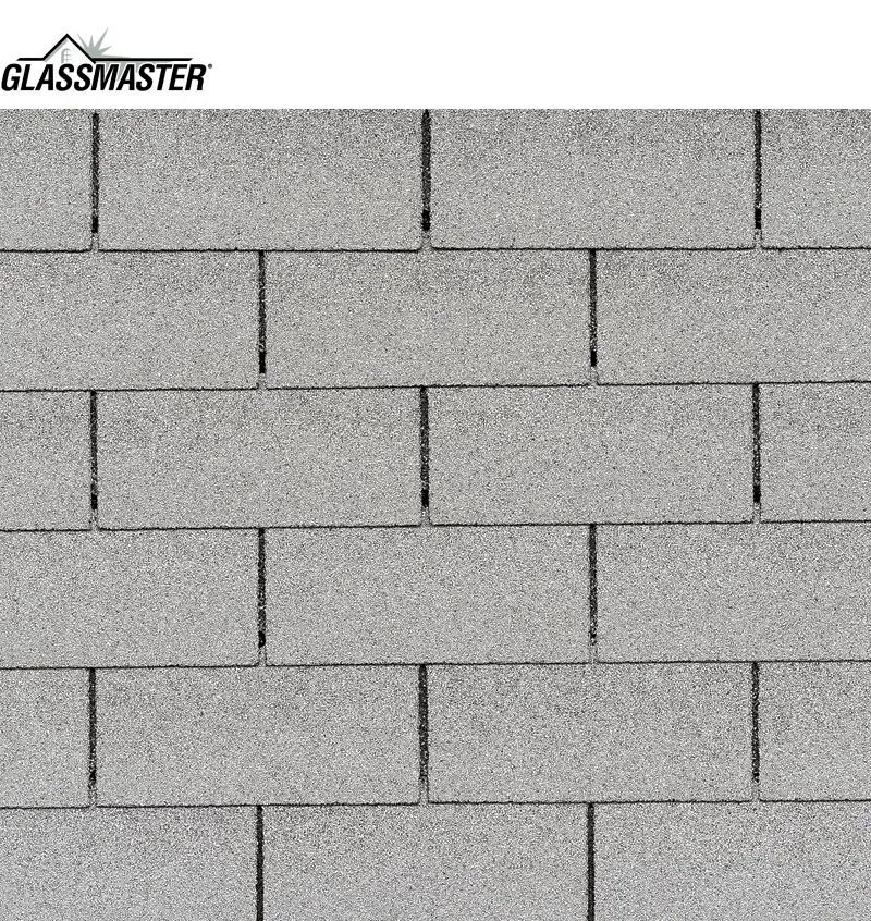 Gray asphalt roof shingles in a brick-like pattern.