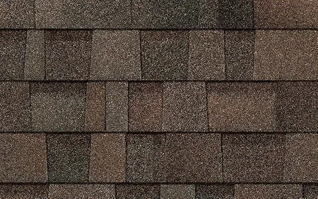 Brown asphalt roof shingles.