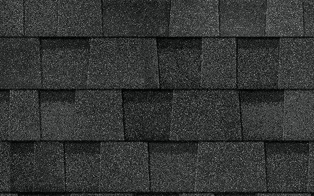 Dark gray asphalt roof shingles.