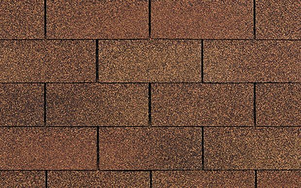 Brown asphalt roof shingles.