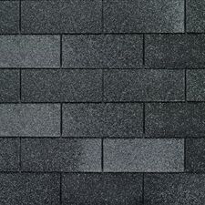 Dark gray asphalt roof shingles.