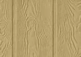 Tan wooden paneling with vertical grain and knot detailing.