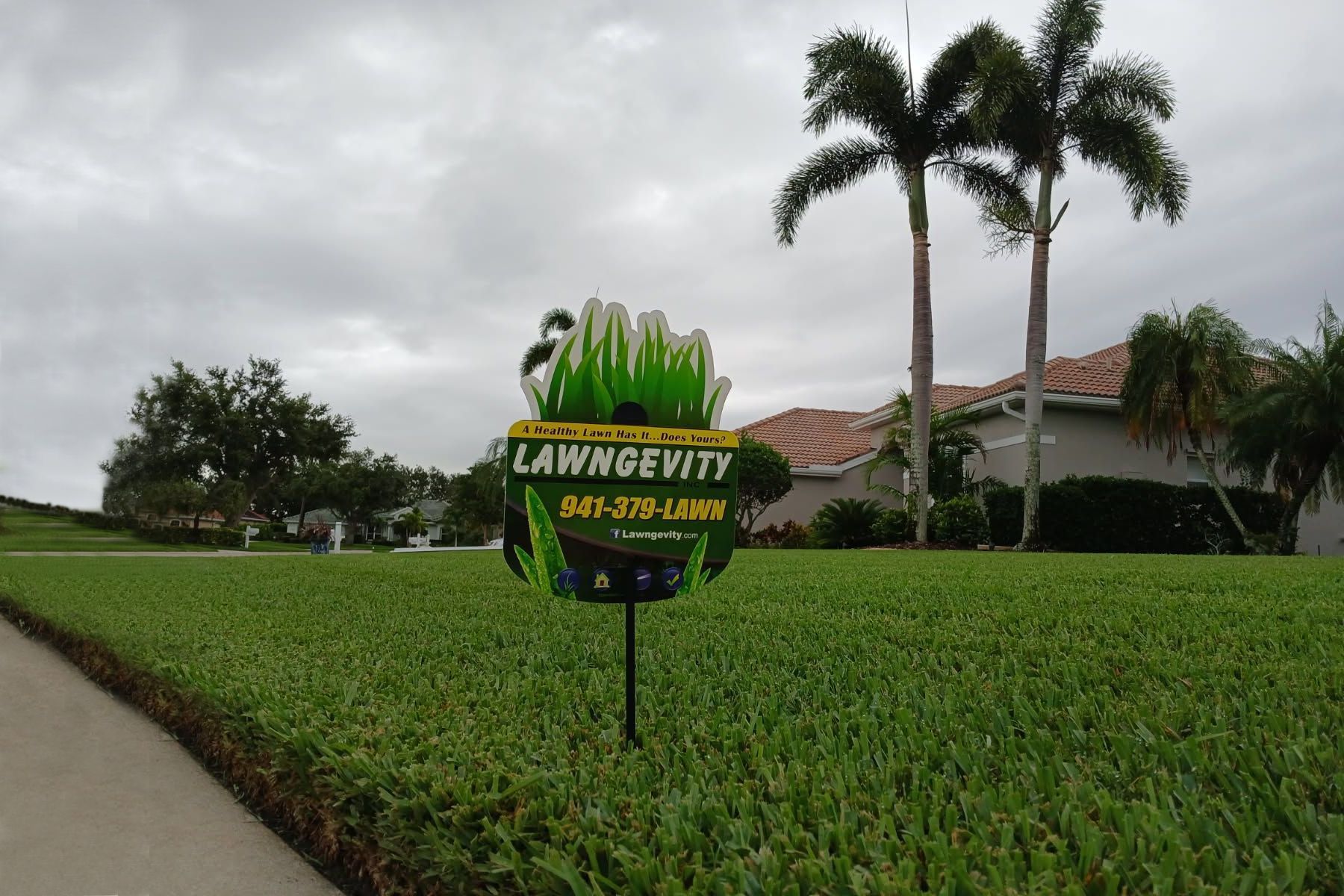 A sign that says lawn & evitt on it