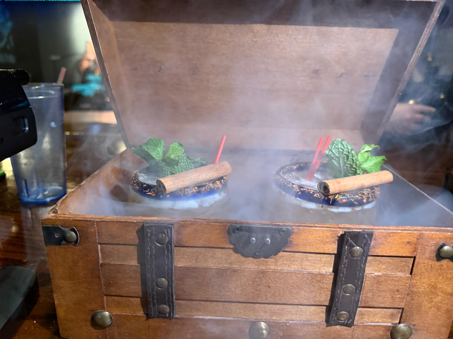 Two delicious foods in a wooden chest with smoke.