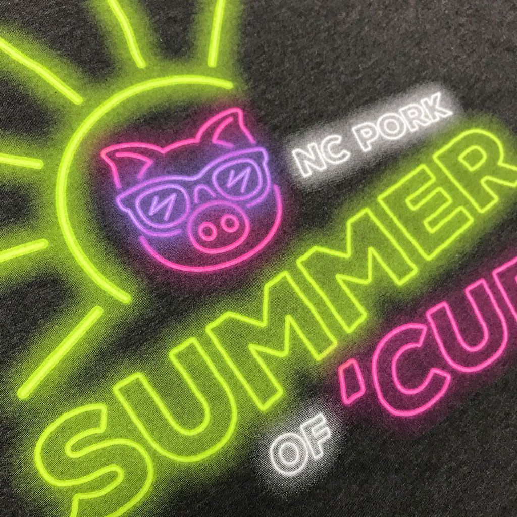 A neon-style graphic featuring a pig wearing sunglasses inside a sun, with the text 