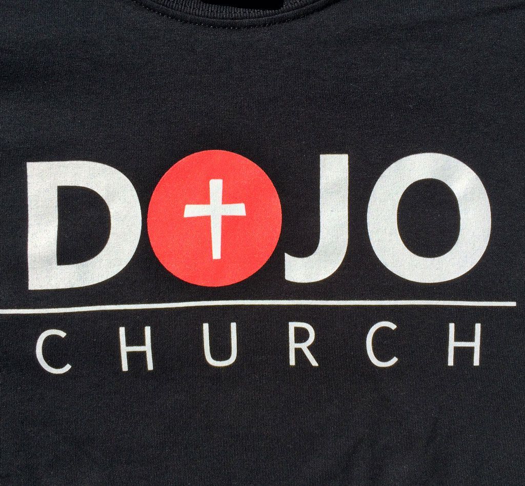 A black shirt with white text reading 