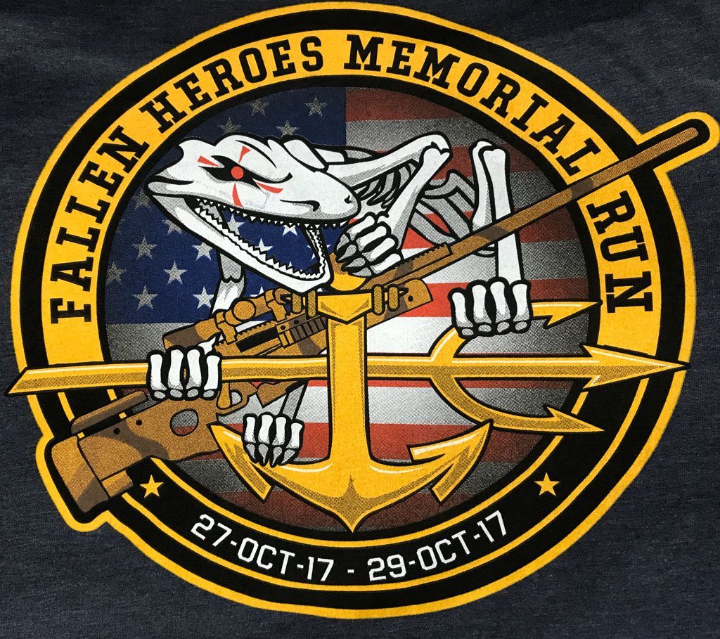 Emblem for a 2017 Fallen Heroes Memorial Run featuring a skeletal figure holding a rifle and trident over a US flag.