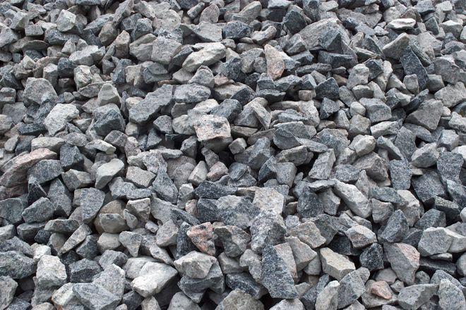 Pile of gray gravel stones filling the frame