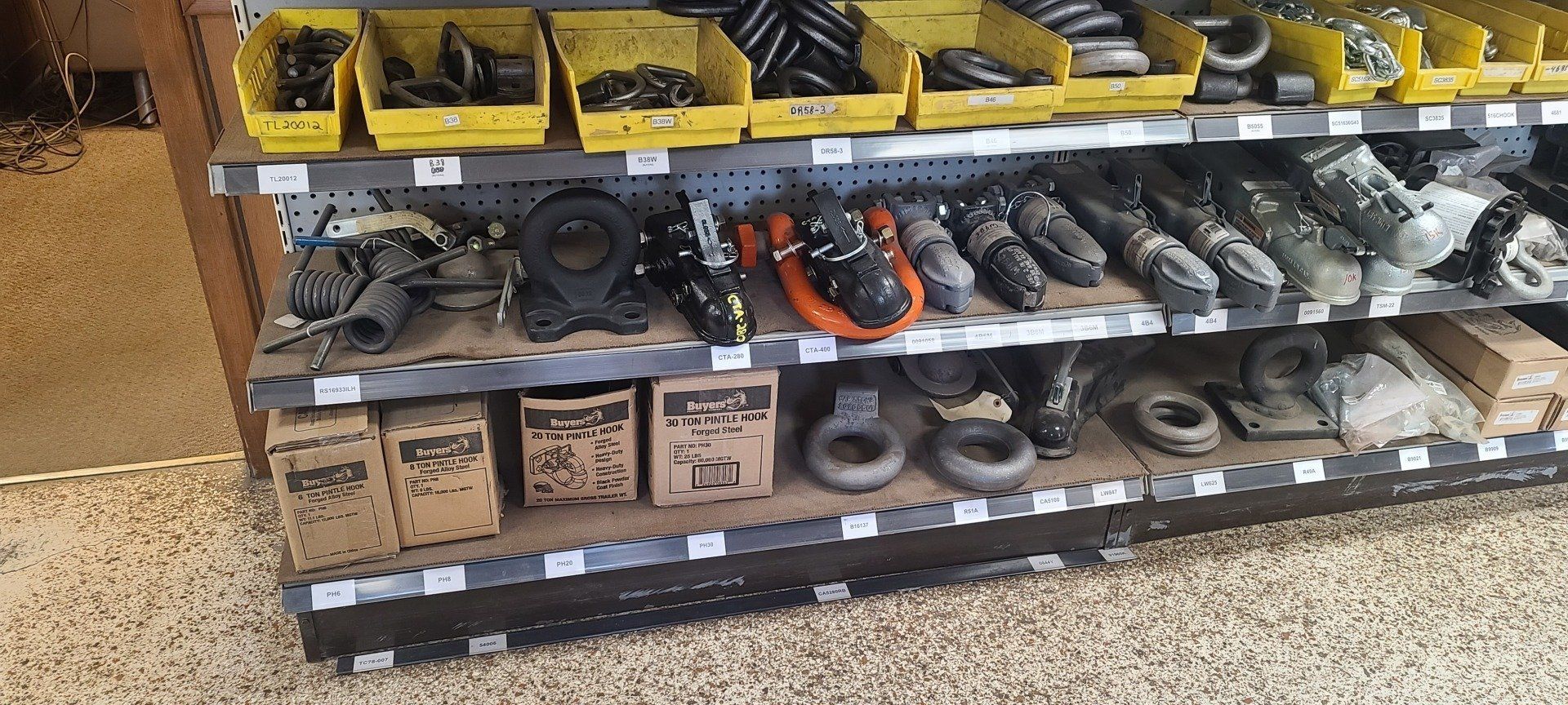 Photo of a variety of parts on a shelf.