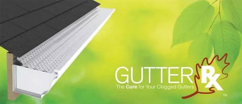 GutterRx gutter cover on a roof with green leaves and yellow background