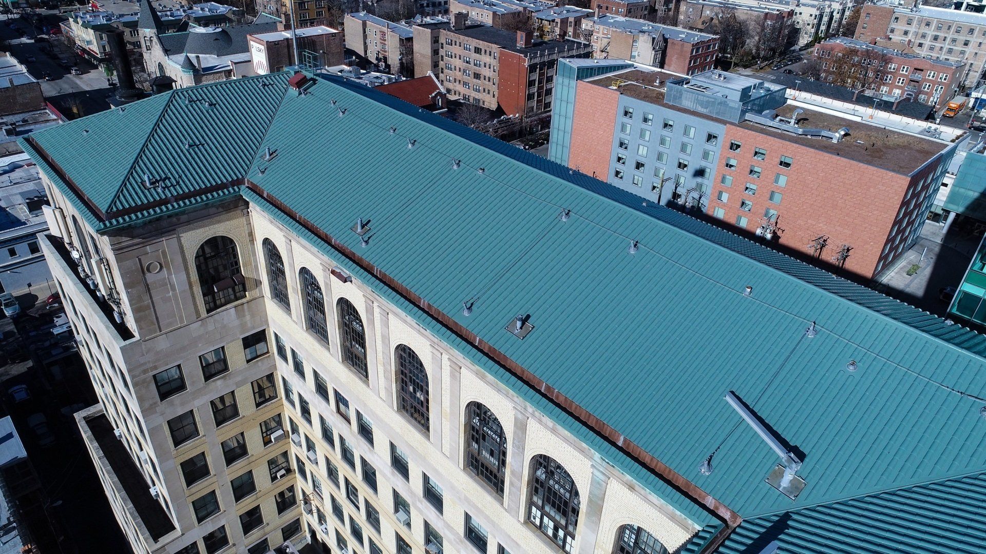 New metal roof and inlaid copper gutter