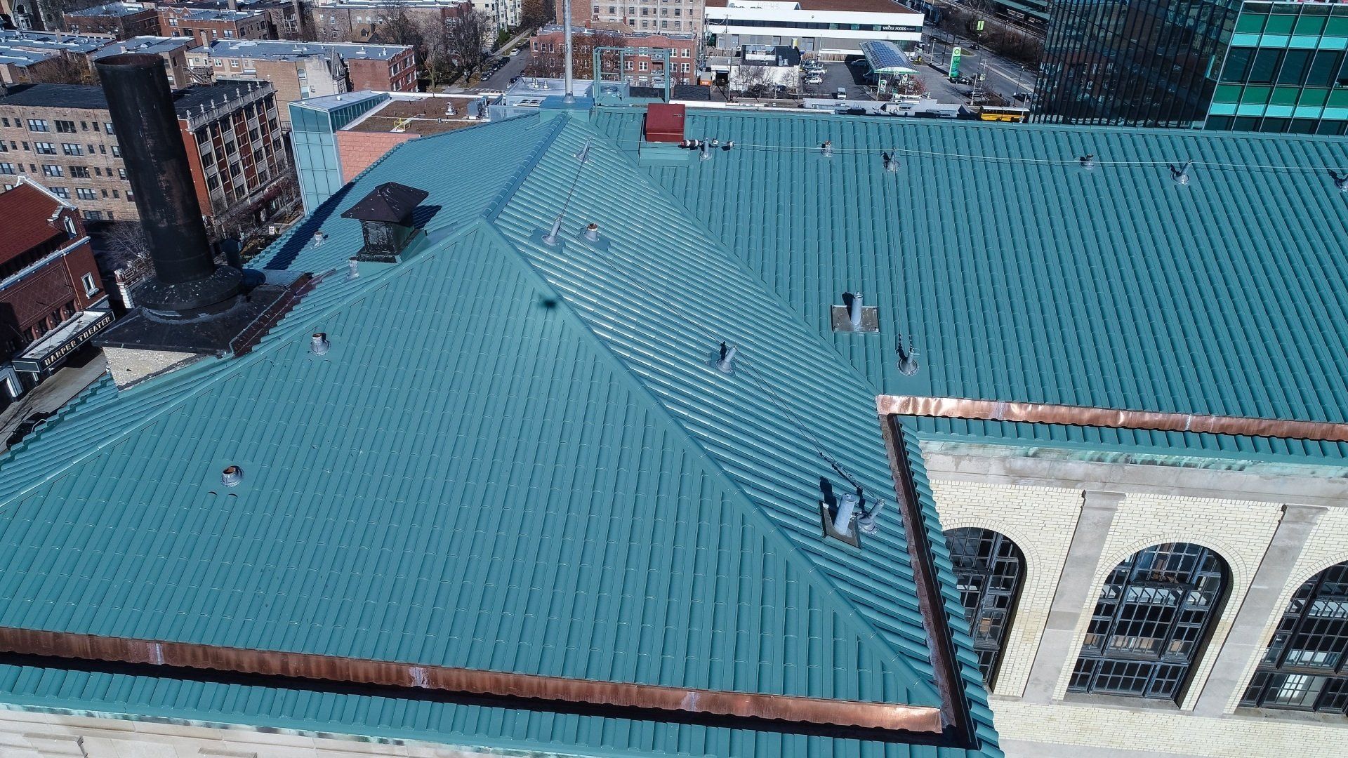 New metal roof and inlaid copper gutter