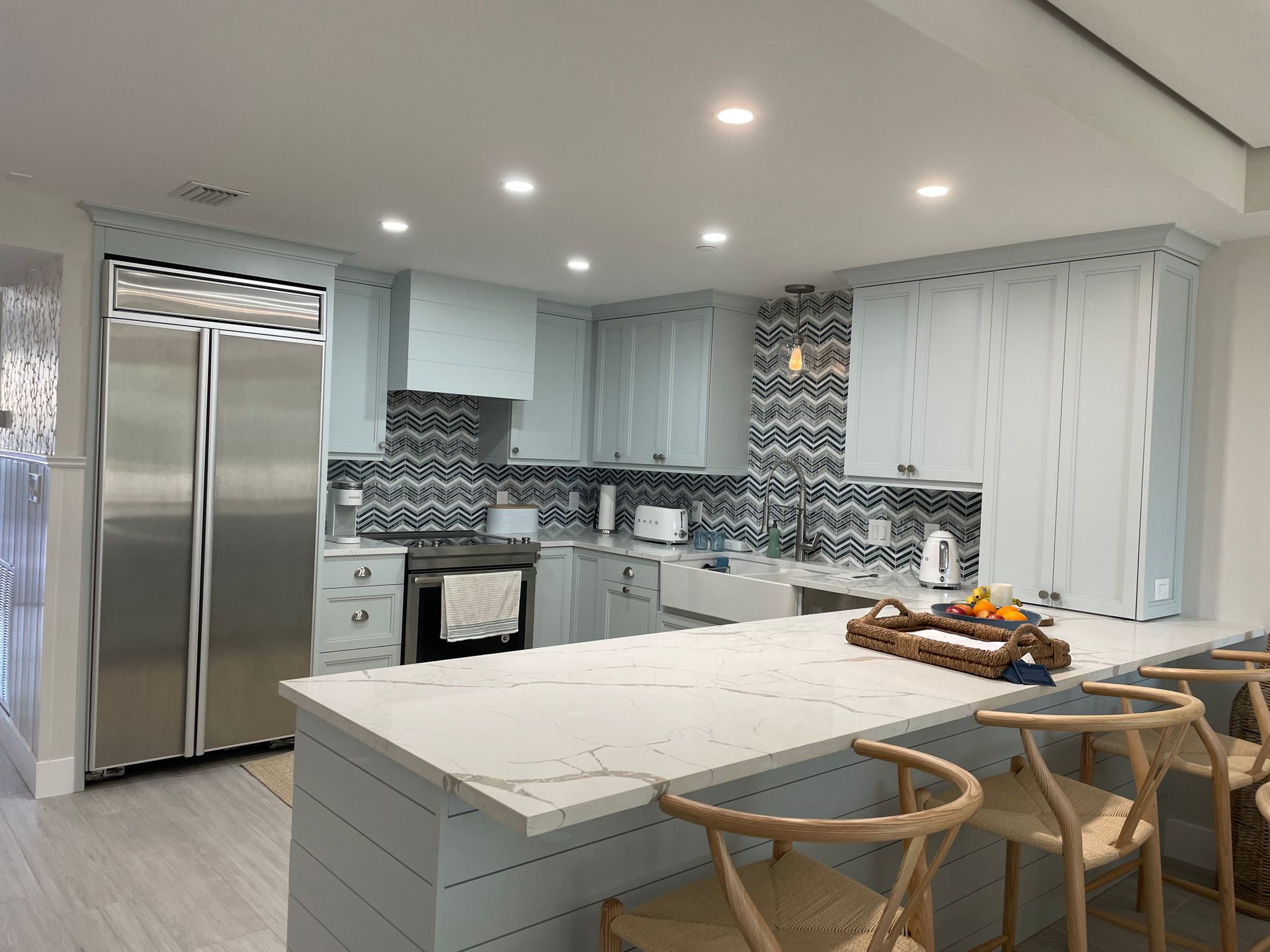 Kitchen with bar table and chairs
