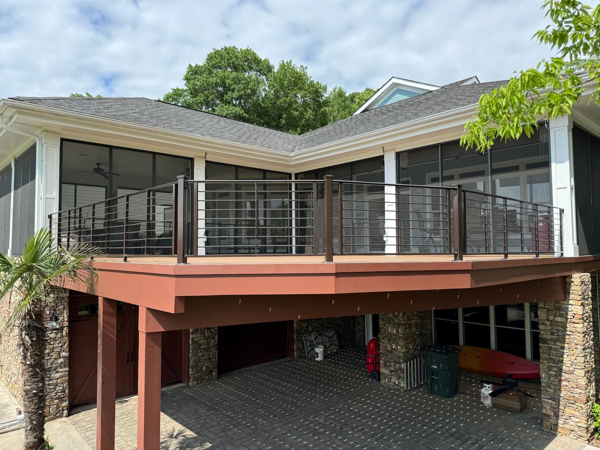 House with elevated deck and covered parking underneath