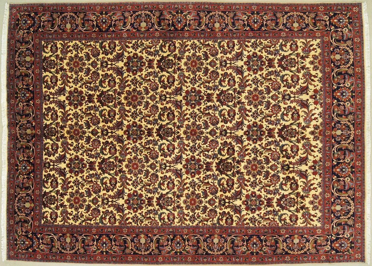 Oriental rug with cream background, repeating floral pattern, and burgundy border.