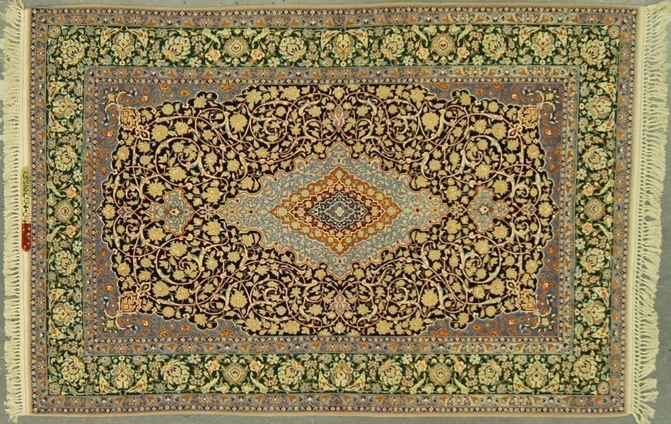 Oriental rug with intricate floral pattern in shades of brown, beige, green, and blue.