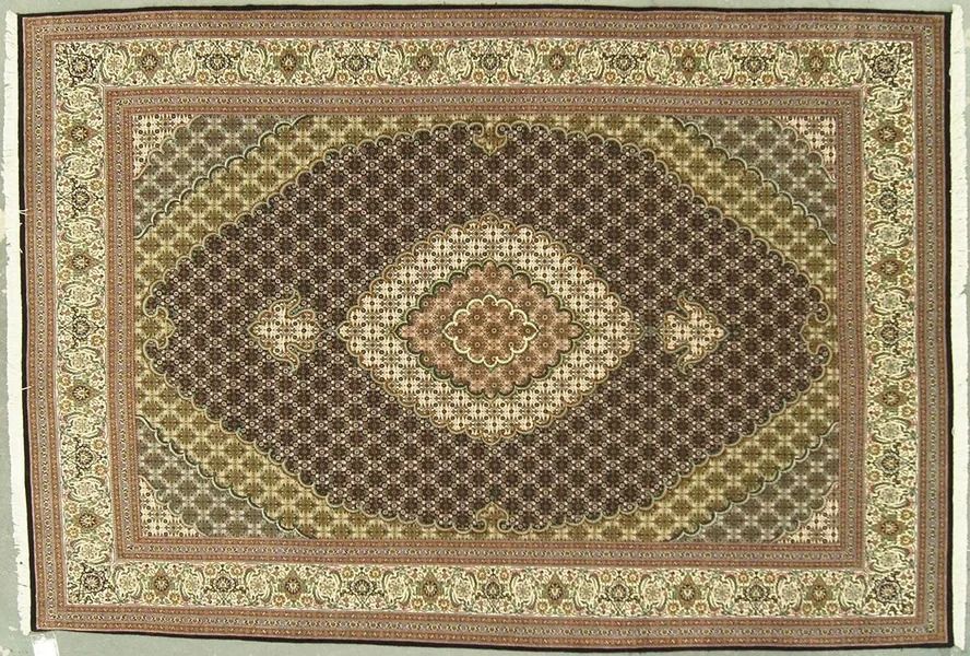 Ornate rectangular rug with brown, tan, and cream diamond lattice pattern and central medallion.