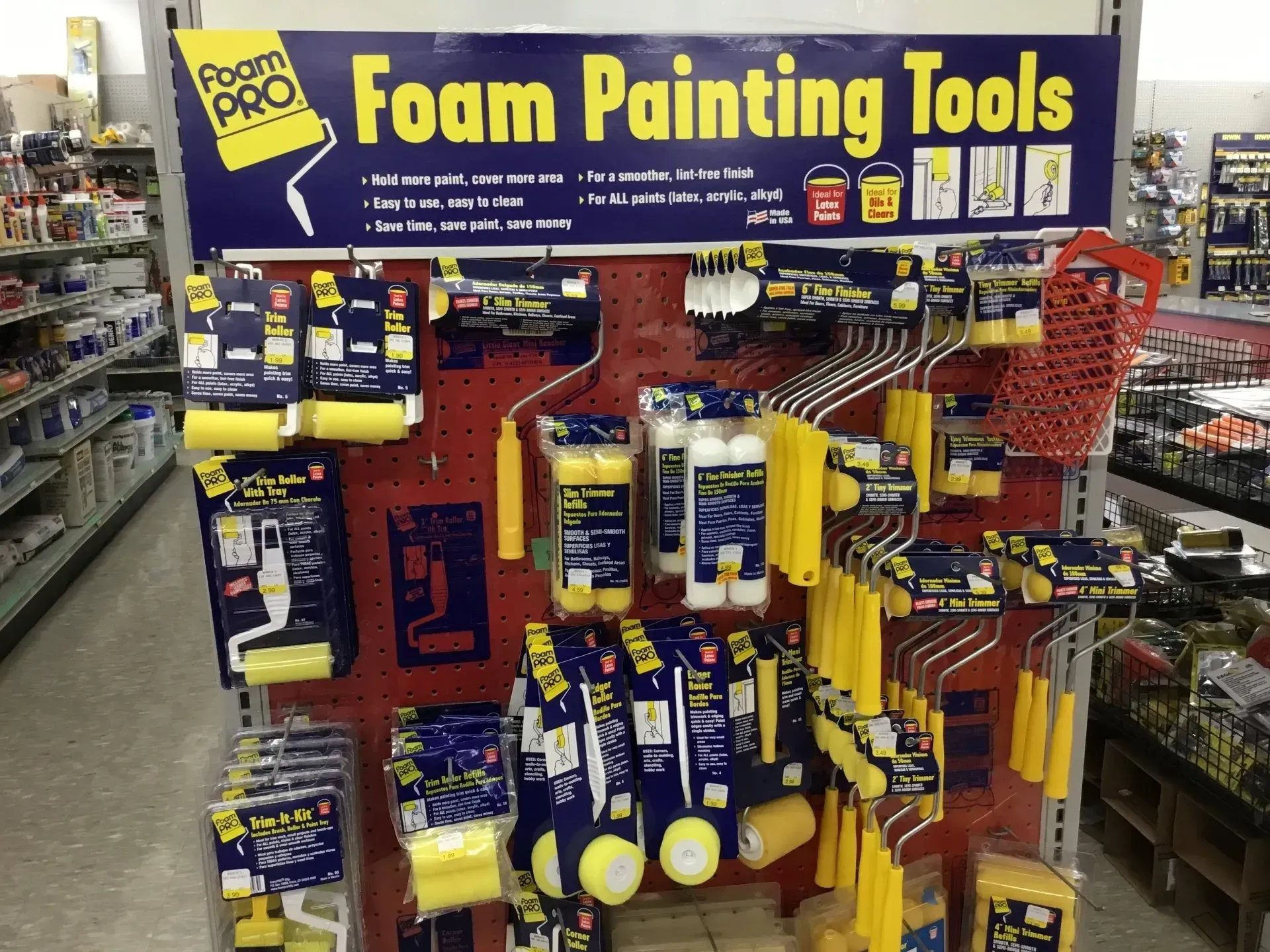 Store display of Foam Painting Tools in purple-and-yellow packaging on a retail aisle rack