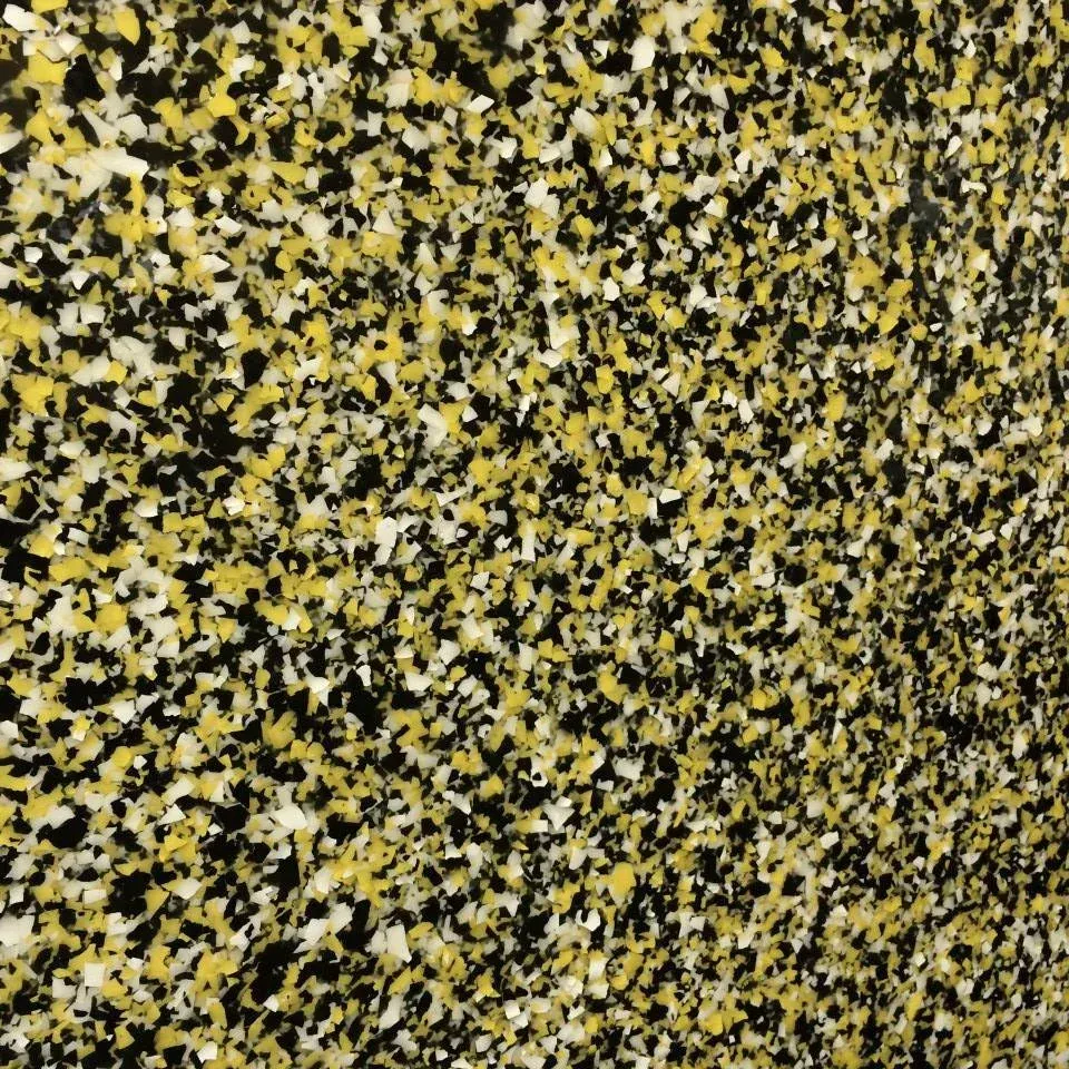 Close-up view of a speckled floor. The color scheme is black, yellow, and white flecks throughout.