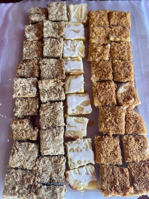 A tray of different types of desserts on a table