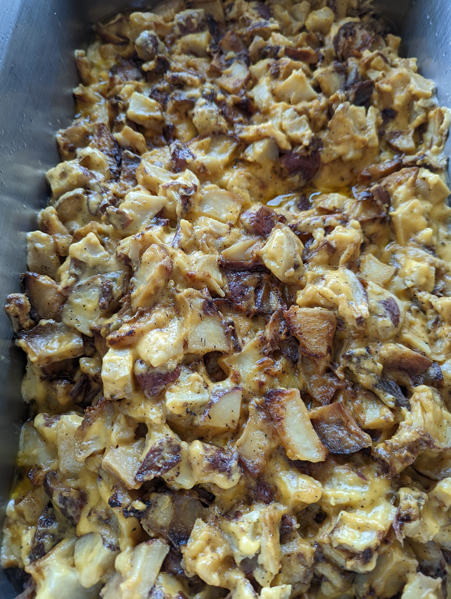 A close up of a casserole dish filled with food.