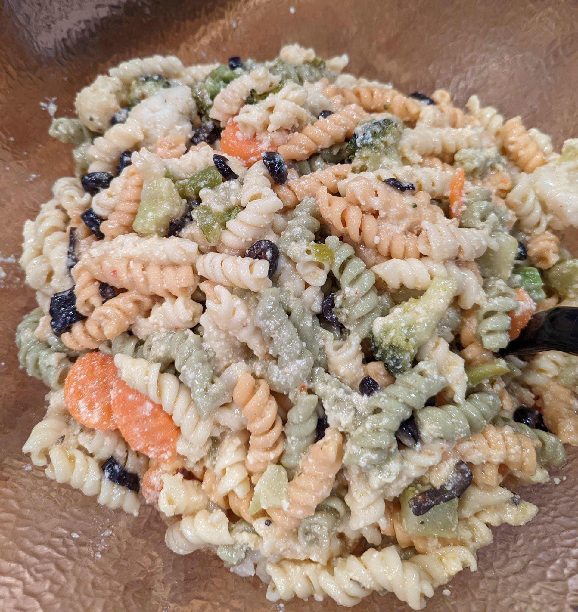 A close up of a pasta salad on a plate