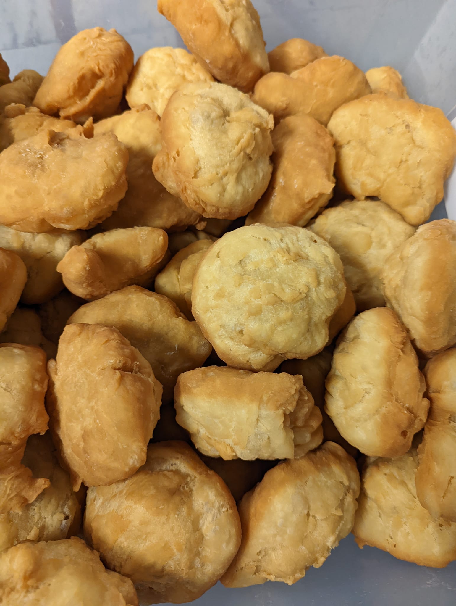A pile of fried food is sitting on a table.