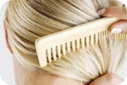 Woman combing hair