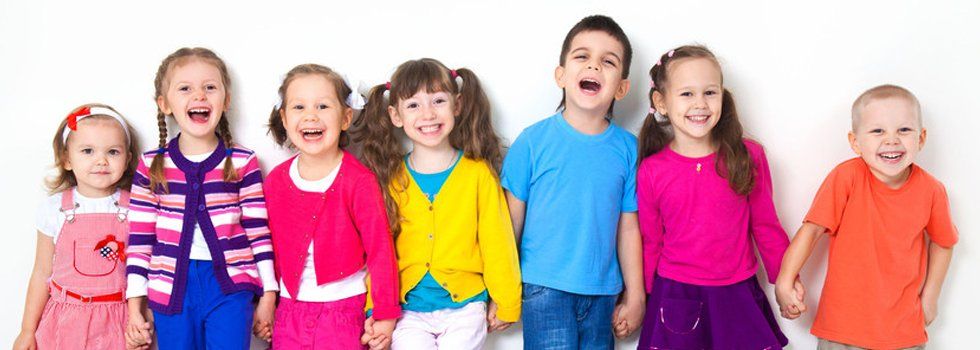 Children with colorful tops