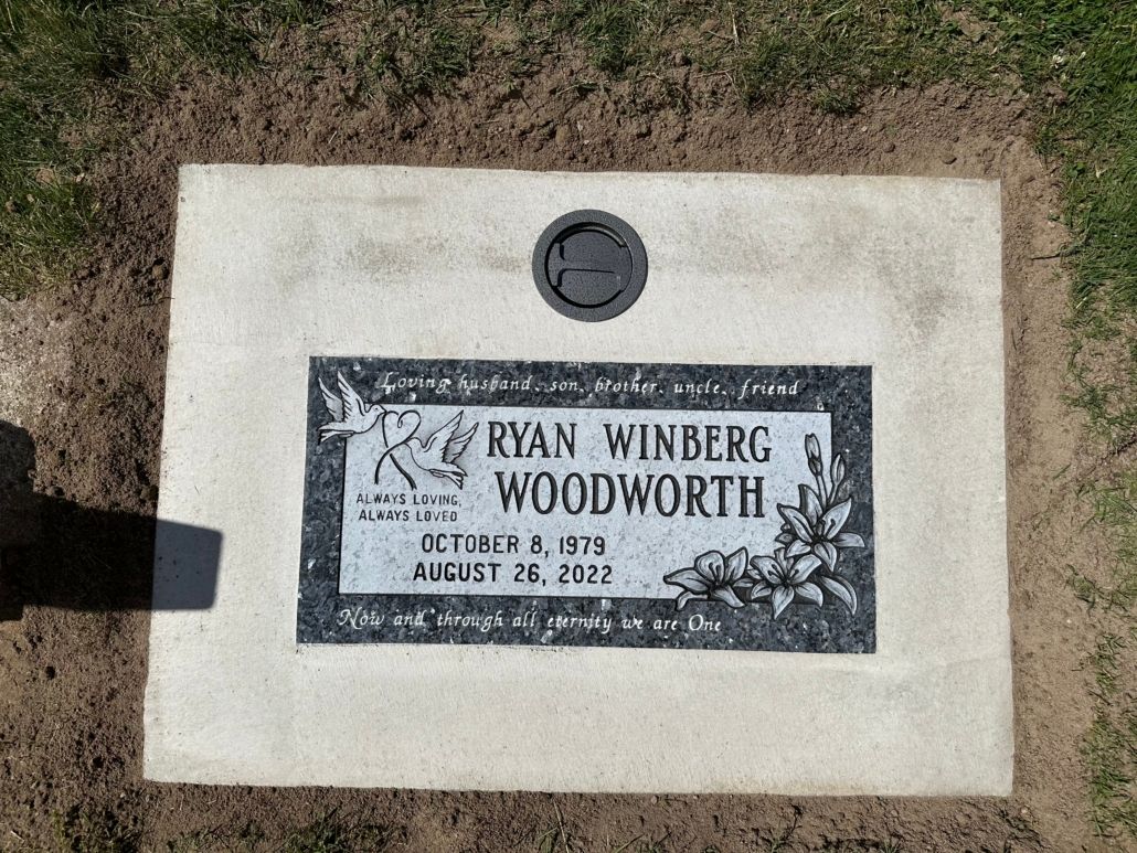 Grave marker of Ryan Winberg Woodworth, born July 5, 1978, died August 26, 2022.