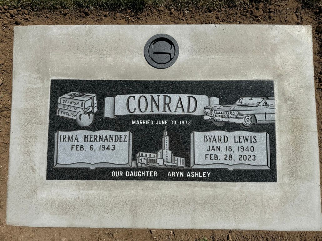 Headstone: Conrad family name. Includes names, birth/death dates for Irena, Ward. Building/vehicle symbols.