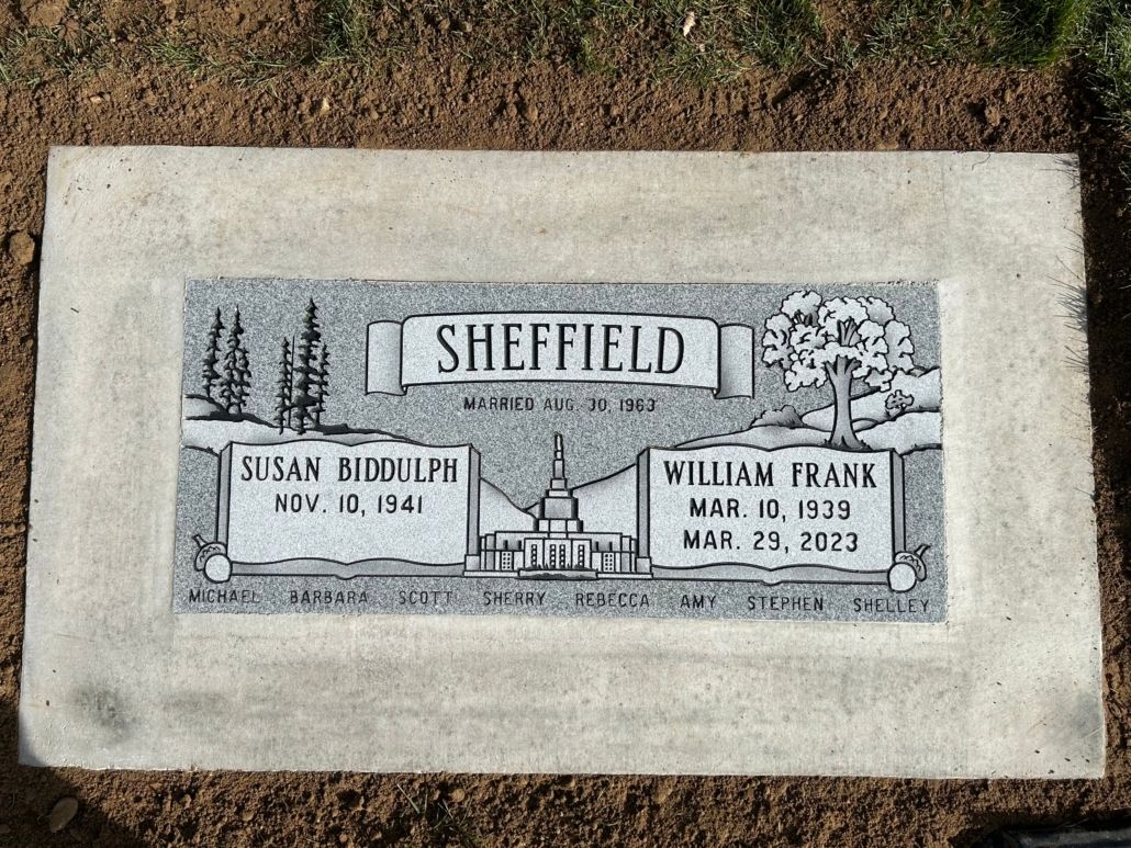 Gray headstone with Sheffield engraved, flanked by names, birth & death dates, set in a light gray rectangular border.