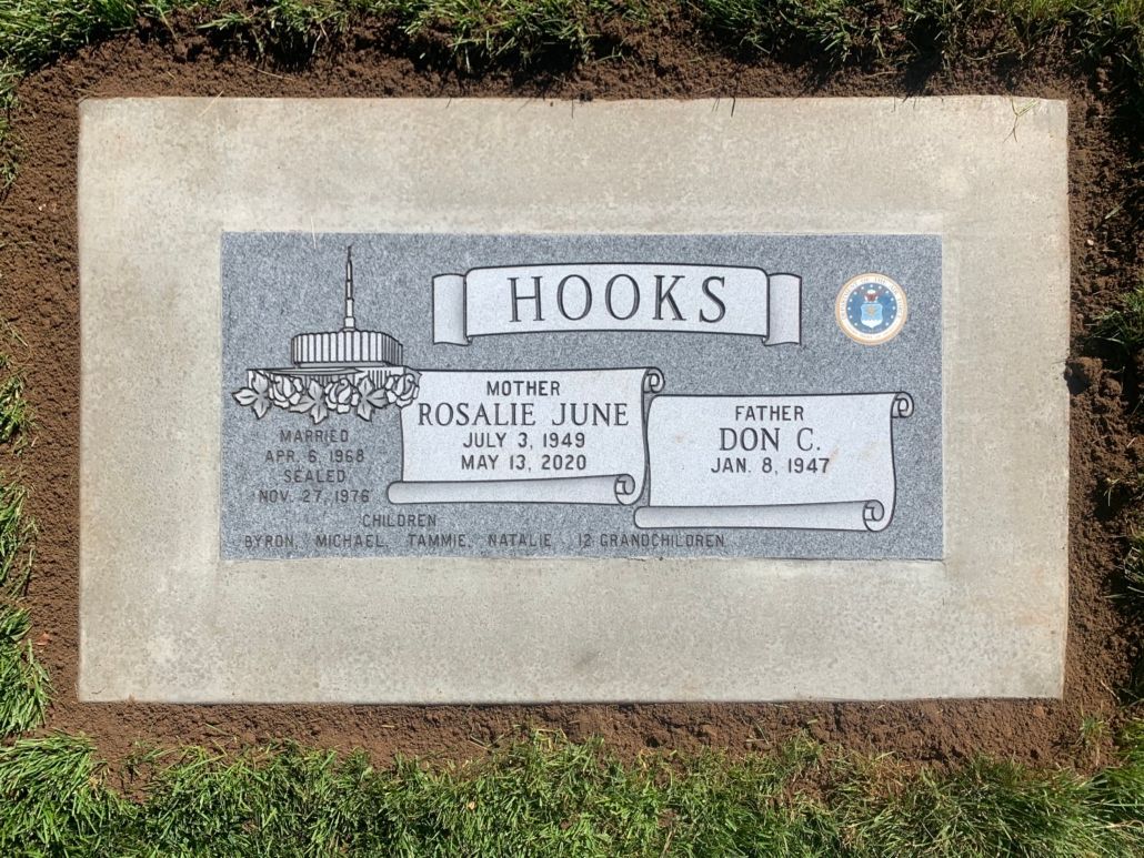 Headstone for Rosalie June Hooks and Jon L. Hooks, with navy symbol.