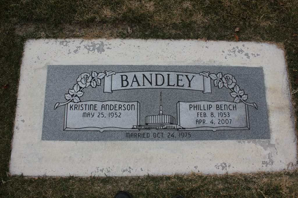 Grave marker for the Bandley family. Names include Kastere Anderson and Phillip Mitch, with their dates.