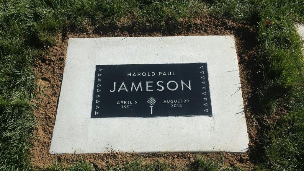 Grave marker for DAVID PAUL JAMESON. Black plaque on concrete, surrounded by grass.