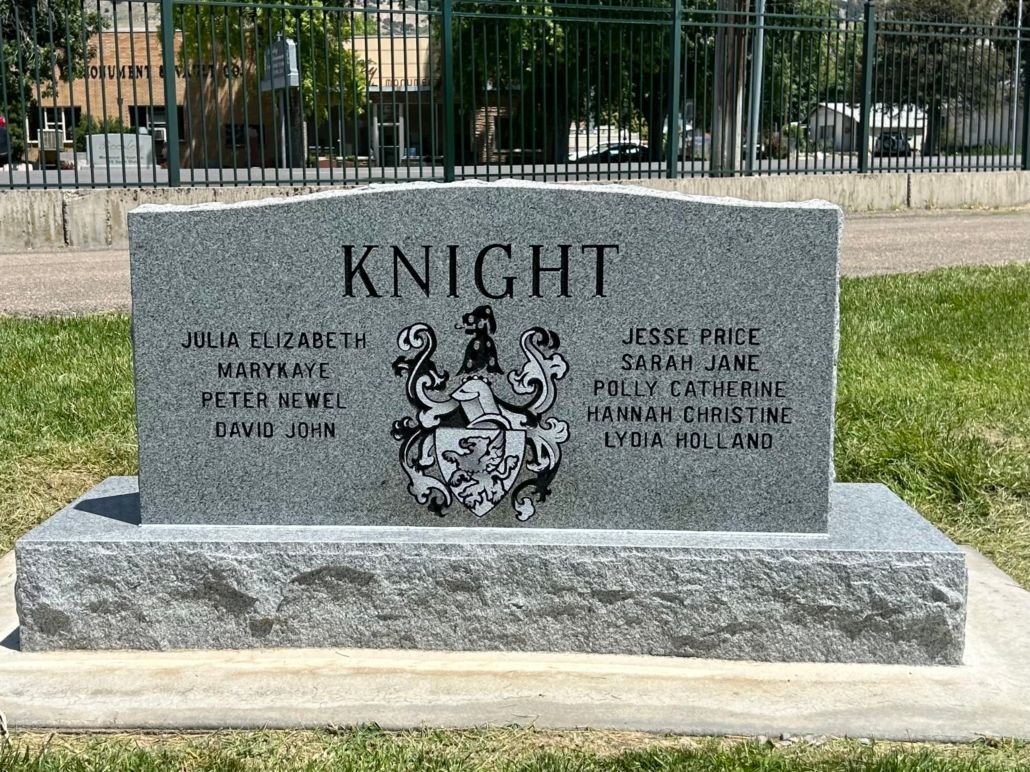 Gray headstone with the surname 