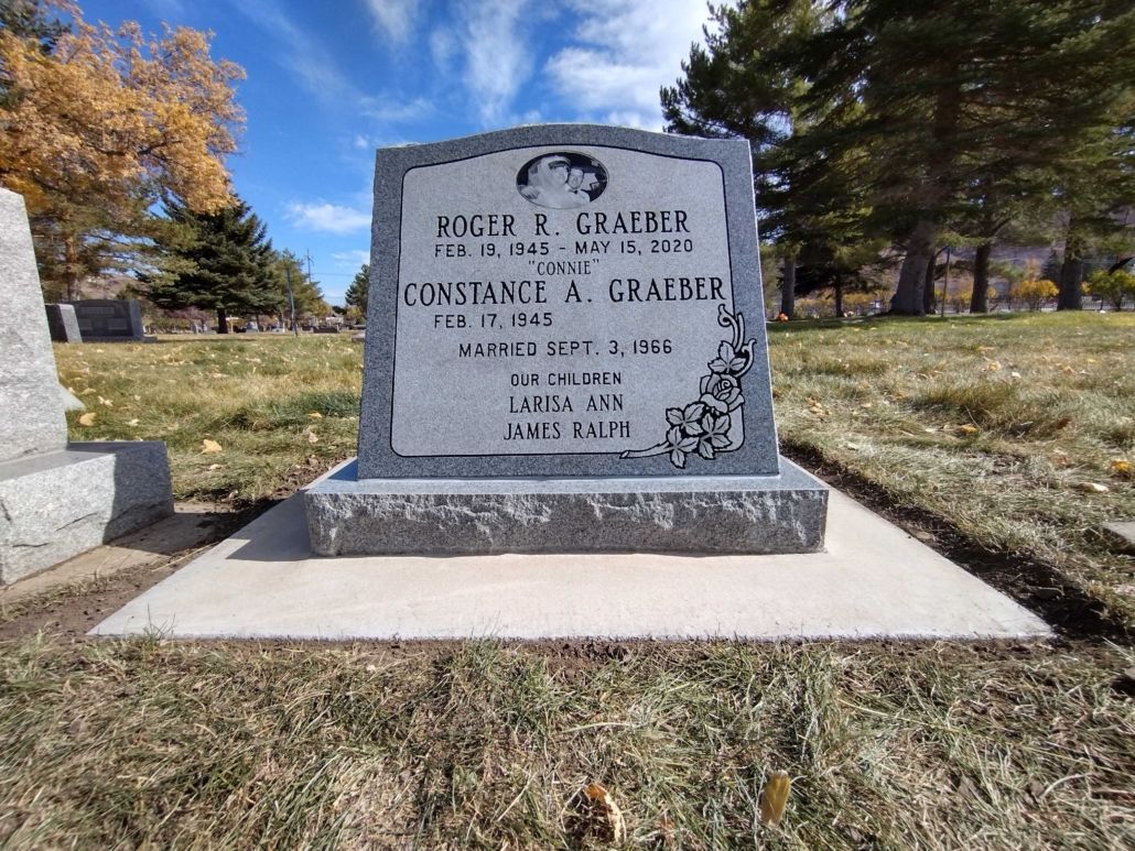 Gray headstone of Roger and Constance Graber in a cemetery.