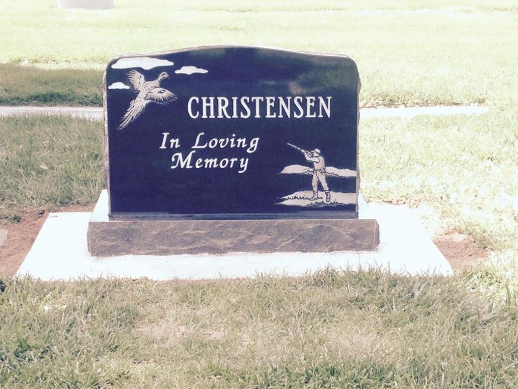Black headstone with 