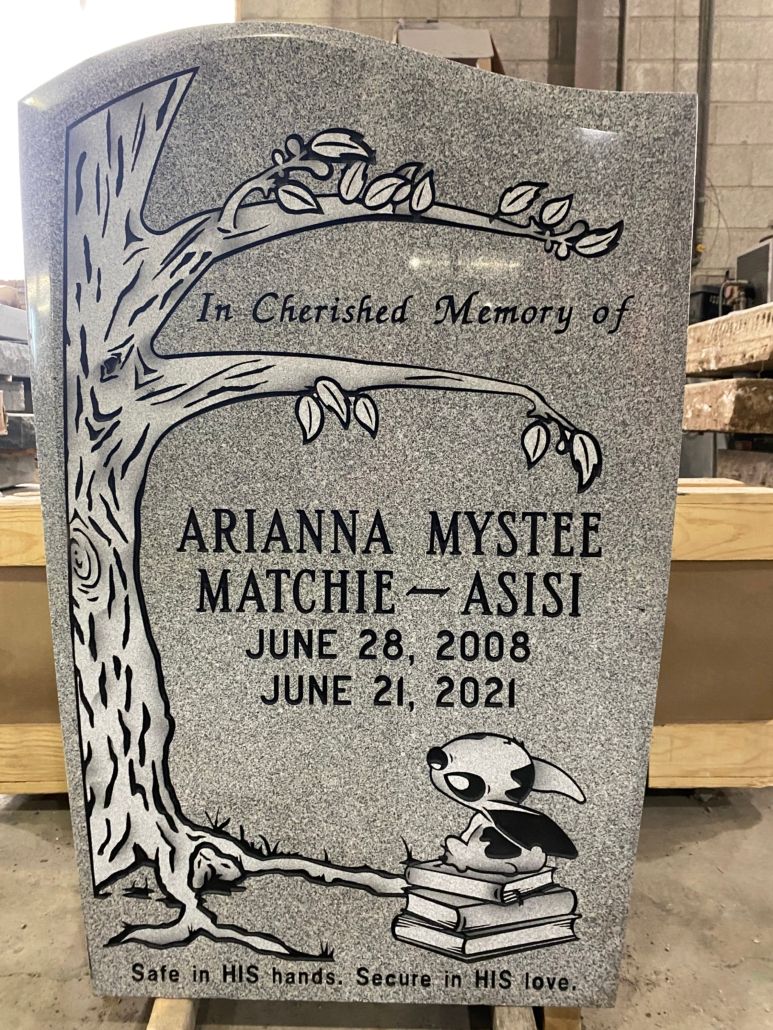Gravestone with a tree design, name Arianna Mystee Matchie-Asisi, birth and death dates: June 28, 2008 - June 21, 2021.