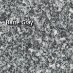 Barre Gray granite surface with speckled gray and white pattern.
