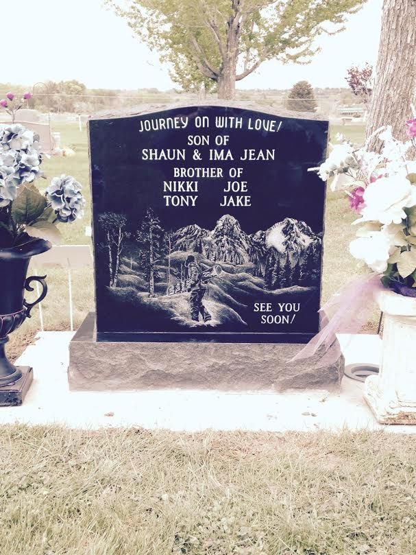 Headstone with the inscription Journey on with Love dedicated to Shaun & Ima Jean.