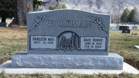 Gray headstone with WORKMAN engraved