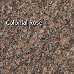 Close-up of Colonial Rose granite. Brown, pink, and black speckled pattern.