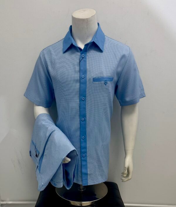 A mannequin is wearing a light blue shirt and a light blue jacket