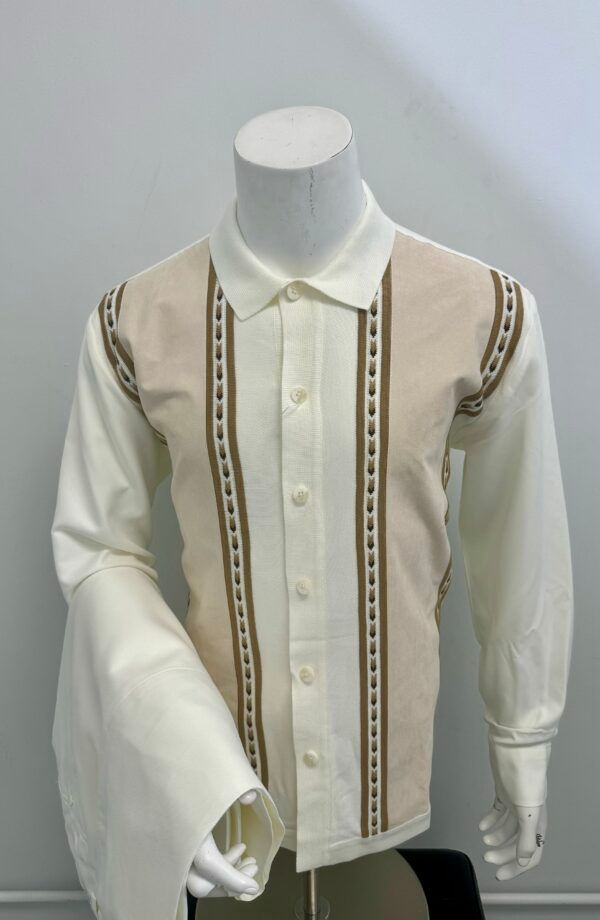 A mannequin is wearing a white shirt with brown stripes on the sleeves.
